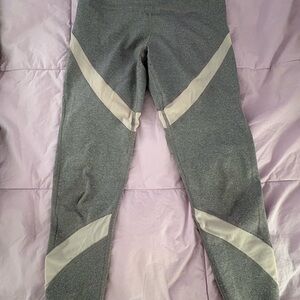 Gray Aerie Leggings with mesh on legs and inside pocket.